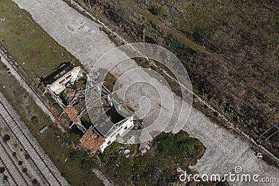 Aerial image of a ruined building in an old train station. Concept of evolution, antiquity and passage of time Stock Photo