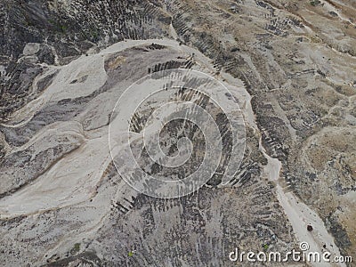 aerial scene of the land erosion due to deforestation and earth mining. Stock Photo