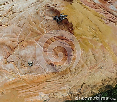 aerial scene of the land erosion due to deforestation and earth mining. Stock Photo