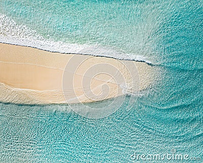 Aerial landscape of a beach at sunrise with stunning blue water Stock Photo