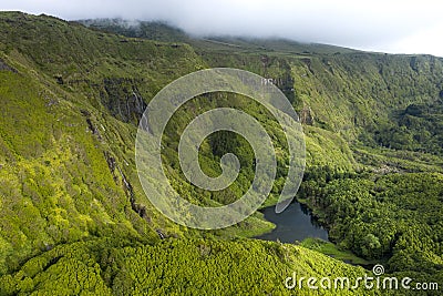 Aerial landscape image of sunset sunrise over PoÃ§o Ribeira do Ferreiro waterfalls and Lagoa dos Patos with its remarkable amazing Stock Photo