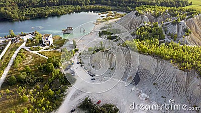 Aerial landscape Sand Hills of Quarry With a Pond and Abandoned Prison in Rummu Estonia Europe. Stock Photo