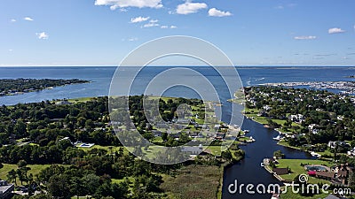 Aerial landscape shot over Bay Shore, Long Island, New York, the US on a sunny day Stock Photo