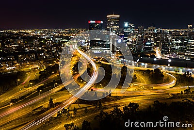 Aerial long exposure of the nighttime skyline and the traffic of the city of Perth, Australia Editorial Stock Photo