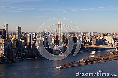 Aerial Midtown Manhattan New York City Skyline along the East River with Roosevelt Island and the Queensboro Bridge Stock Photo