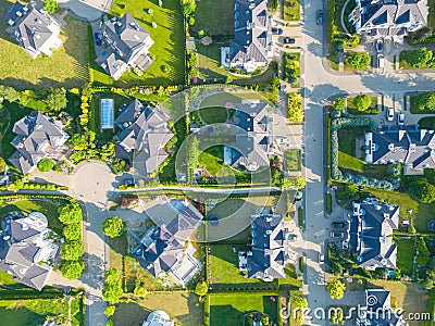 Aerial of new construction luxury residential neighborhood street single family homes real estate Stock Photo