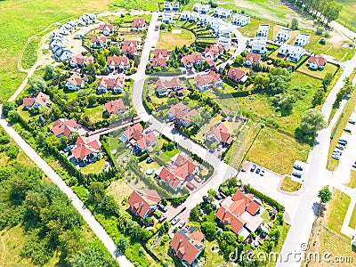 Aerial of new construction luxury residential neighborhood street single family homes real estate Stock Photo