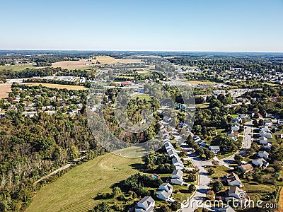 Aerial of New Freedom and surrounding Farmland in Southern Pennsylvania during Fall Stock Photo