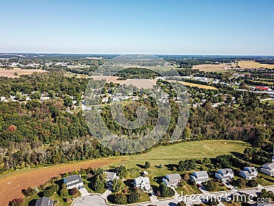 Aerial of New Freedom and surrounding Farmland in Southern Pennsylvania during Fall Stock Photo