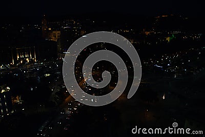 Aerial night view of a city and traffic of cars. Malaga, Spain Stock Photo