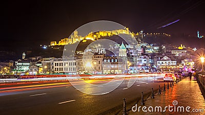 Aerial night view of Old Tbilisi, Georgia with Illuminated churches and Medieval fortress of narikala, 25.11.2016 Stock Photo
