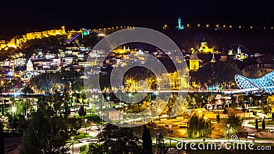 Aerial night view of Old Tbilisi, Georgia with Illuminated churches and narikala Castle Stock Photo
