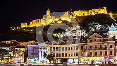 Aerial night view of Old Tbilisi, Georgia with Illuminated churches and narikala Castle Stock Photo