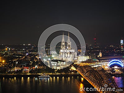 Aerial night view of St Peter Cathedral and Hohenzollern Bridge Stock Photo
