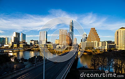 Aerial Over Austin Texas Modern Buildings reflecting Orange Glow off Skyline Stock Photo