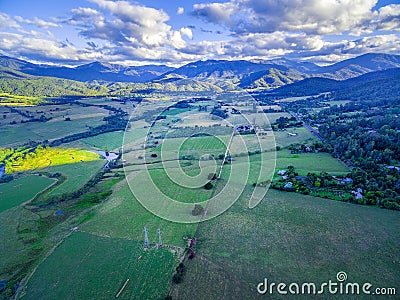 Aerial panorama of beautiful Australian agricultural countryside at sunset. Kiewa Valley, Victoria, Australia. Stock Photo