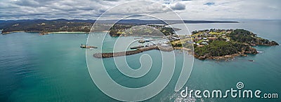 Aerial panorama of the lookout point where people watch for whales and wharf in Eden, NSW, Australia. Stock Photo