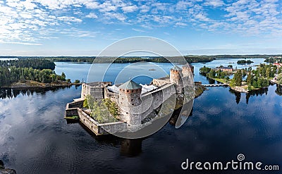 Aerial panorama of Olavinlinna castle and the surrounding lakes in Savonlinna, Finland Stock Photo