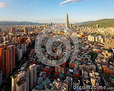 Aerial panorama over Downtown Taipei, capital city of Taiwan with view of prominent Taipei 101 Tower amid skyscrapers Stock Photo