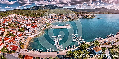 Panorama of a scenic resort town Neos Marmaras with yacht marina sea port in Halkidiki, Sithonia. Travel attractions and Stock Photo