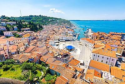 Aerial panorama view of Piran city, Slovenia. Look from tower in church. In foreground are small houses, Adriatic sea in Stock Photo