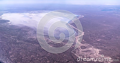 Aerial Panorama view to saline Barsa Kelmes lake and Ustyurt plateau at Karakalpakstan, Uzbekistan Stock Photo
