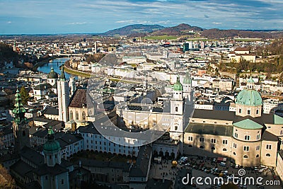 Aerial panoramic view of the historic city of Salzburg with Salzach river in beautiful winter day of sun Stock Photo