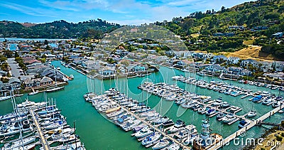 Aerial Paradise Cay Yacht Harbor full of boats with wide view of rich waterfront properties Stock Photo