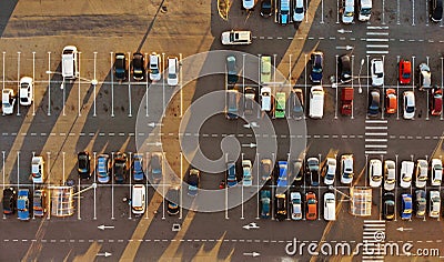 Aerial. Parking lot with cars, sunset Stock Photo