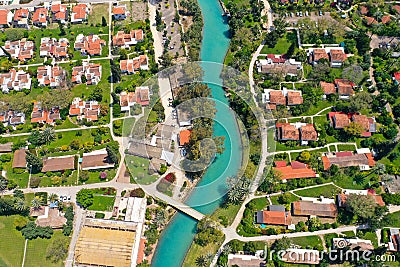 Aerial pass over Kibbutz Nir David with Amal river, Israel. Stock Photo