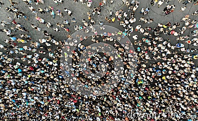 Aerial. People crowd on a city square background. Top view Stock Photo