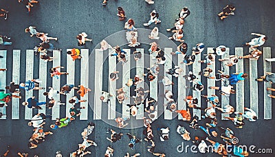 Aerial. People crowd on pedestrian crosswalk. Top view background. Toned image Editorial Stock Photo