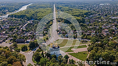 Aerial photo of ancient european Chernihiv town with church, trees and buildings near highway Stock Photo