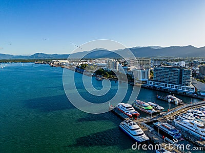 Aerial photo of Cairns biat harbour and cityscape with perfect blue water and sky Stock Photo