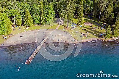 Aerial photo of Cultus Lake in Chilliwack, B.C. while people are enjoying the summer activities at the lakeshore and doing Stock Photo