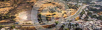 Aerial photo of massive ancient theatre of Halicarnassus, Bodrum, Turkey with road crossing town. historical places Stock Photo