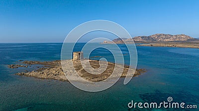 Aerial photo of the old prison tower on Isola Della Pelosa in the northwest of Sardinia in the Province of Sassari Stock Photo