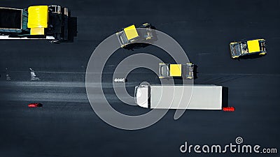 Aerial photo. Road repair background. Road roller machines roll asphalt. Top view Stock Photo