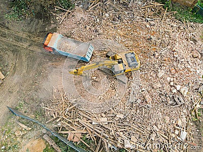 Drone photo of urban demolition site. excavator working in ruins Stock Photo