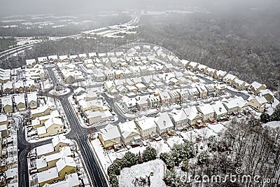 Aerial view snow covered houses in Atlanta Georgia suburbs Stock Photo