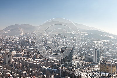 Aerial Picture of the newer part of Sarajevo during a snow winter day. Unitic Towers and Holiday Inn are on foreground Editorial Stock Photo