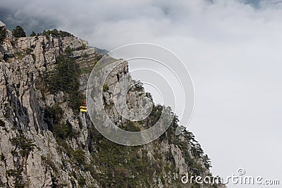 Aerial ropeway cabin in mountains Stock Photo