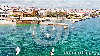 Aerial from sailing in the harbor from Lagos in the Algarve Port Editorial Stock Photo