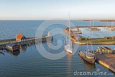 Aerial from sailingship arriving in the little harbor from Hindeloopen in Friesland the Netherlands Stock Photo