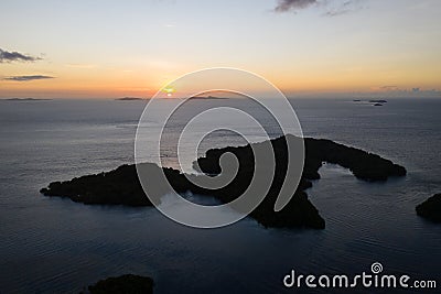 Aerial of Serene Sunset and Island of Yangeffo in Raja Ampat Stock Photo