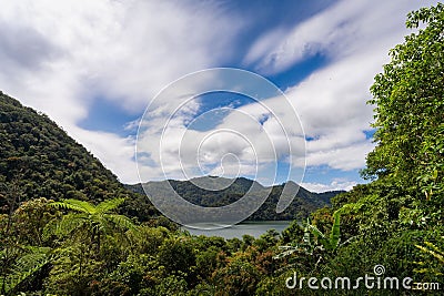 Aerial shot of Balinsasayao Twin Lakes, Negros Oriental, Philippines surrounded by lush green forest Stock Photo