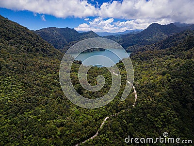 Aerial shot of Balinsasayao Twin Lakes, Negros Oriental, Philippines surrounded by lush green forest Stock Photo