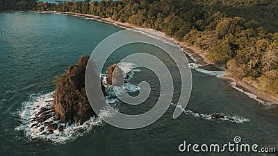 Aerial shot of a cliffy seashore near the ocean in daylight Stock Photo