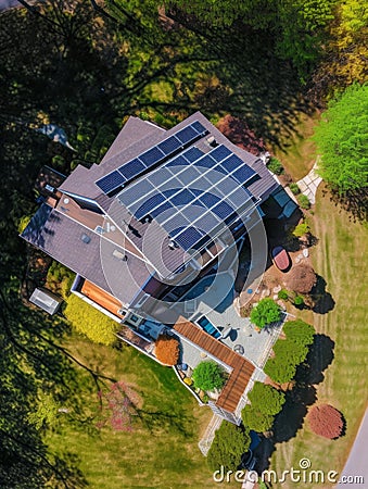 Aerial shot of modern residantal house. Modern ecology building with solar panels. Generative AI Stock Photo