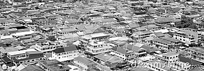 Aerial shot of a normal day in the Asian suburb in black and white Stock Photo